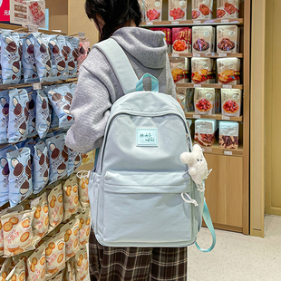 日系软妹高颜值双肩包女纯色百搭初中高中生书包外出旅行背包轻便