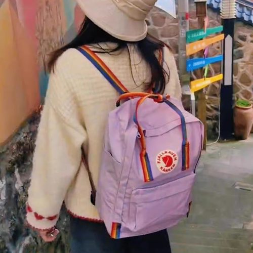 北极狐限量撞色彩虹带男女双肩包