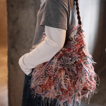 小众气质红色毛毛女生小众单肩包帆布hobo水桶包大容量包包斜挎