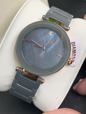 现货美国anne klein1018灰绿色陶瓷珍珠贝母表盘简约女士石英手表