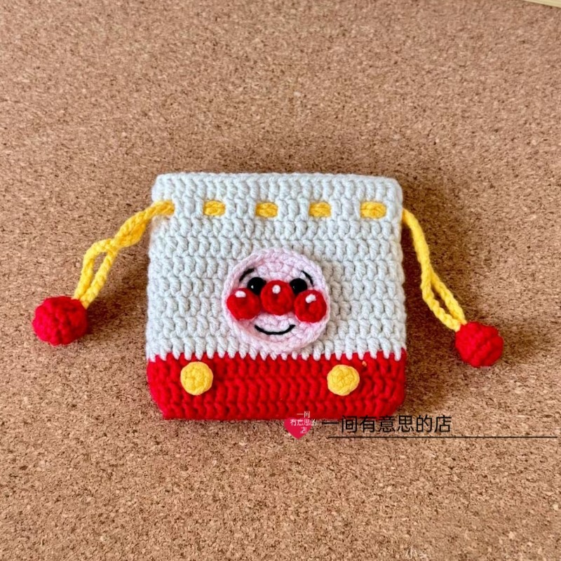 手工成品钩织毛线编织零钱包耳机包面包超人束口包抽绳钥匙包成品