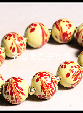 博山手工老琉璃珠子18毫米姜黄色甩彩工艺凤凰涅槃图腾琉璃凤尾珠