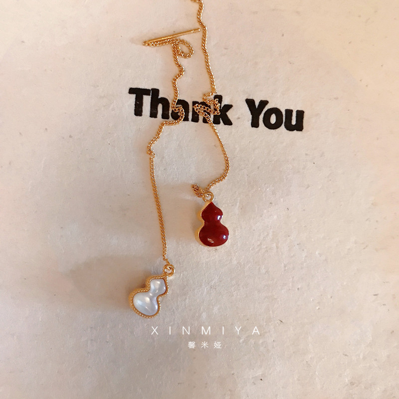 馨米娅高级感双面贝壳葫芦耳线