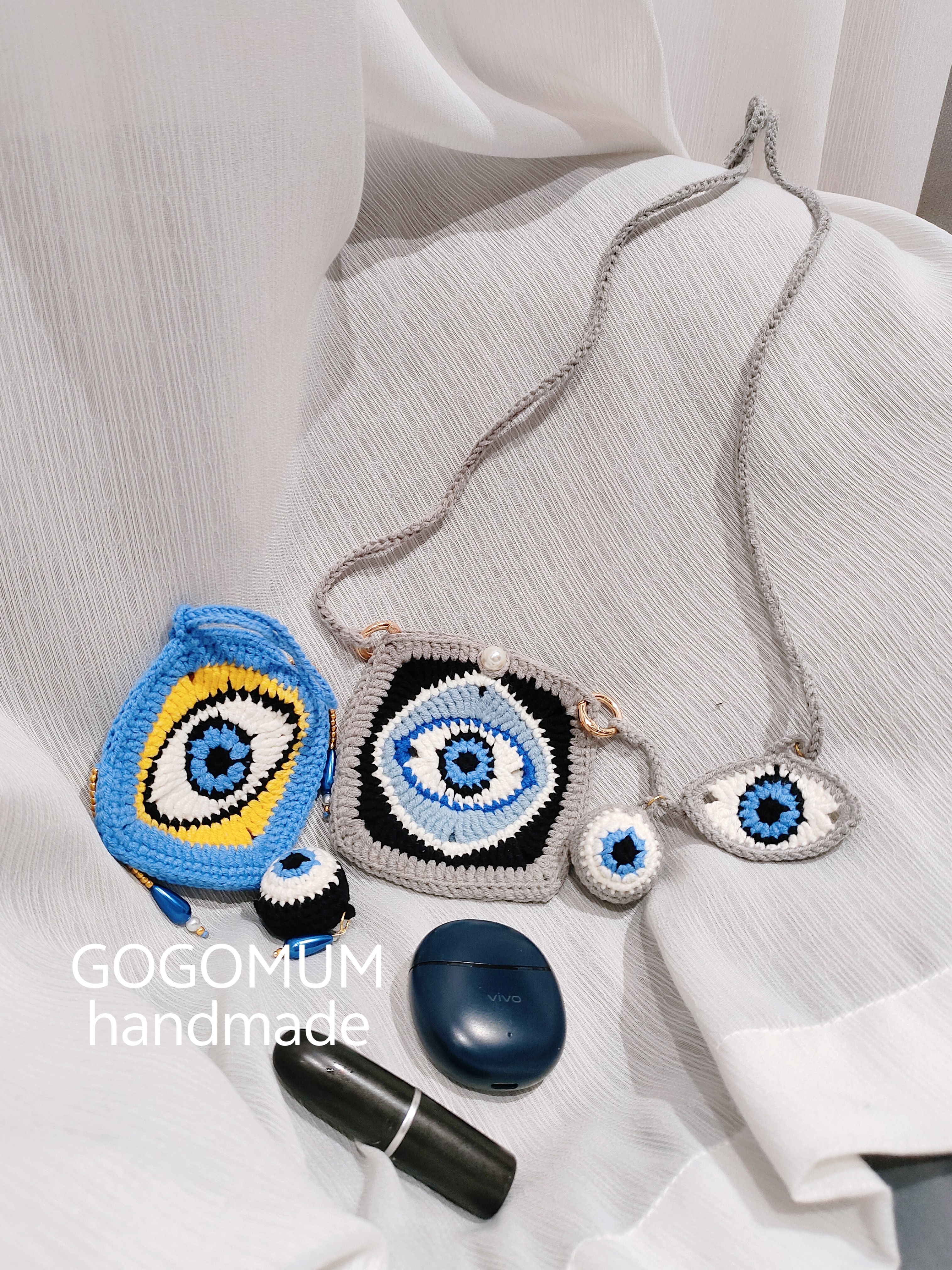 【GOGOMUM】纯手工编织耳机包恶魔之眼零钱包毛线钩织款,服饰配件/皮带/帽子/围巾,DIY编织材料包,淘宝优惠券,粉丝福利购,淘宝优惠卷