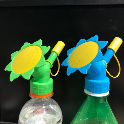 A versatile watering tool that can be used as a flower sprin