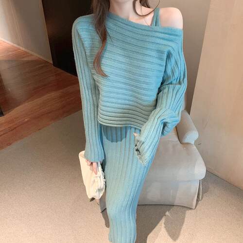Women's pullover sweater paired with knitted camisole