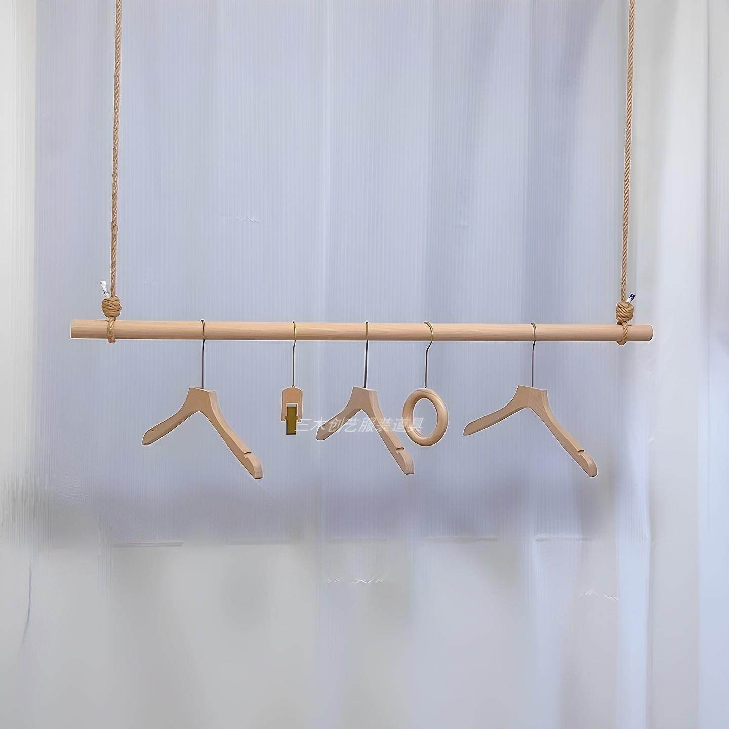 服装店钢丝实木悬挂衣杆简约麻绳吊挂橱窗吊杆上墙悬吊式天花板侧