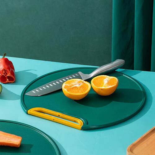 Round plastic cutting board for the kitchen, designed to be