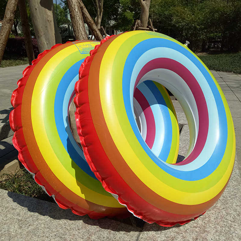 新款户外彩虹七彩游泳圈加厚儿童戏水充气pvc游泳圈水上游泳用品