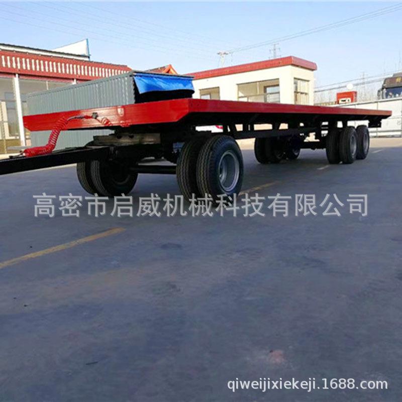 货源供应12轮充气胎平板拖车大型牵引工业平板拖车厂家供应