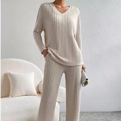Two piece set of straight leg pants with V-neck and pit
