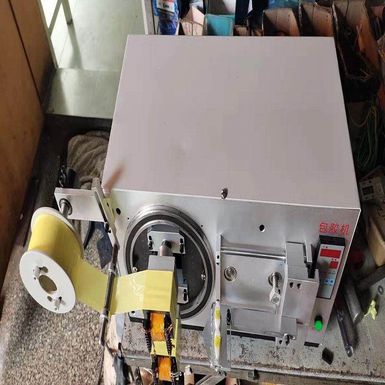 厂家直销变压器加大包胶布机充电器包膜机磁环包胶机加工定做说明