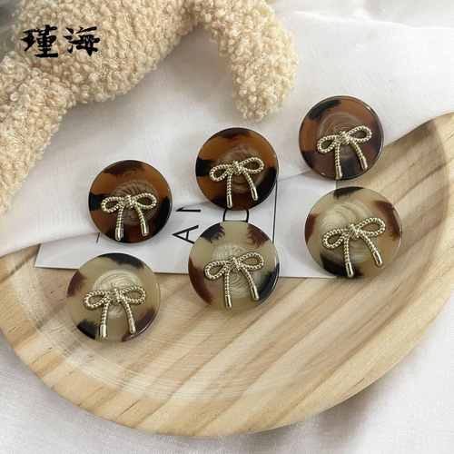 INS风气质金属蝴蝶结纽扣 圆形棒花树脂双拼20-25mm双色 厂家直供