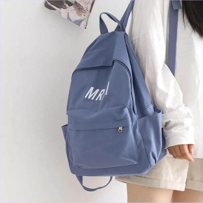 日大量双肩包包2容021新款学大生背包女双肩包中B24221d学生简约