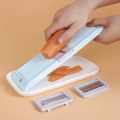 Grater, potato slicer, shredder, and kitchen gadget - a mult