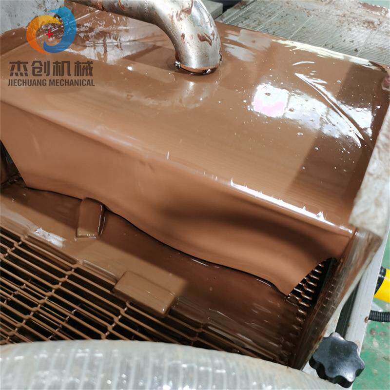 杰创机械研发巧克力涂层机器 脆皮棉花糖裹涂巧克力的设备包安装