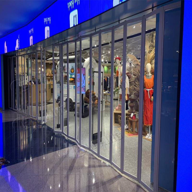 铝合金水晶折叠门香港商铺店铺透明拉闸门商场弧形手动推拉隔断门