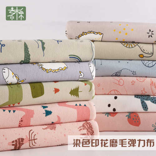素棉婴童服装贴肤针织面料 秋冬保暖印花弹力磨毛布现货