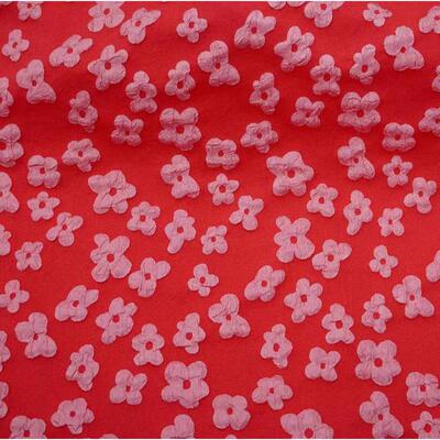 T800秋冬提花连衣裙面料 立体浮雕提花小梅花童装提花面料 箱包布