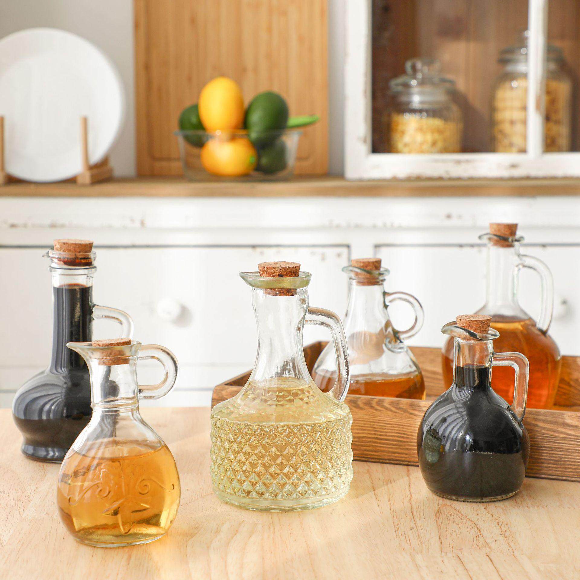 义乌亚马逊透明玻璃瓶子创意雕花把手酱醋壶油壶黄酒分装容器空瓶