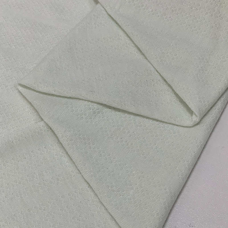 初星纺织竹纤维单面提花针织网眼布面料透气舒适童装家居服针织布