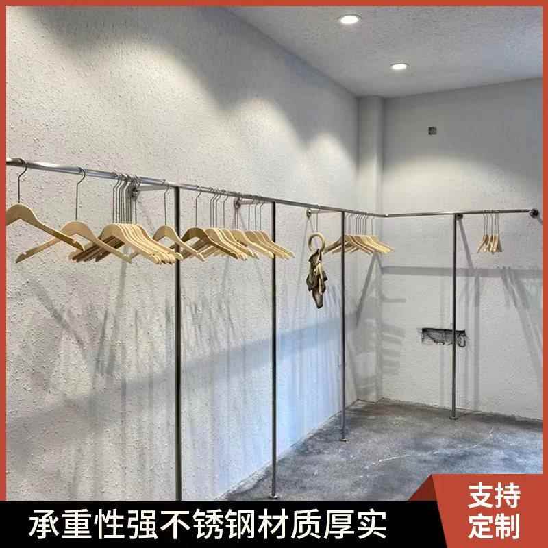 女装店童装服装店展示架上墙专用不锈钢货架落地壁挂式陈列挂衣架