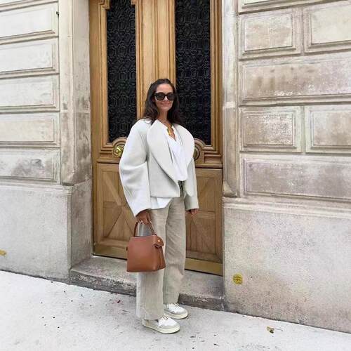 Women's white cardigan jacket with open collar and