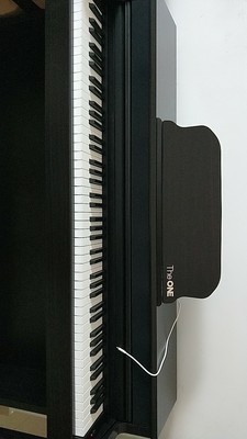 theone智能钢琴怎么样?一位专业人士用后一个月谈感受