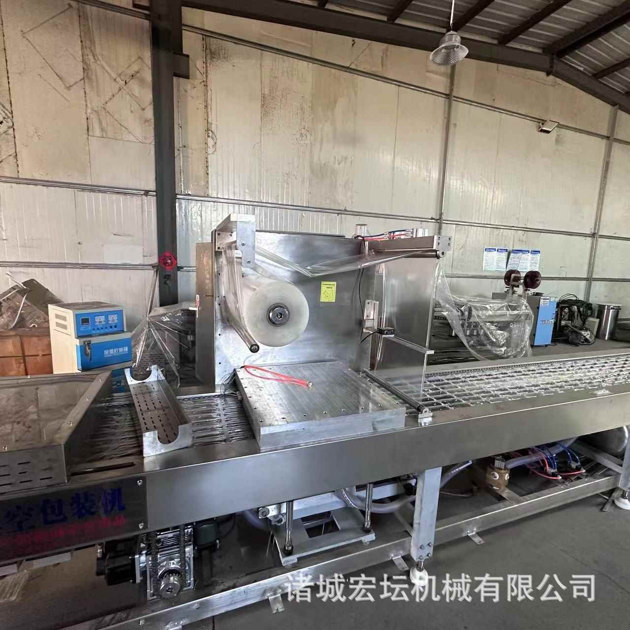 全自动拉伸膜包装机肉干脆肠卤蛋脆骨包装无骨鸡爪真香XWC装空包