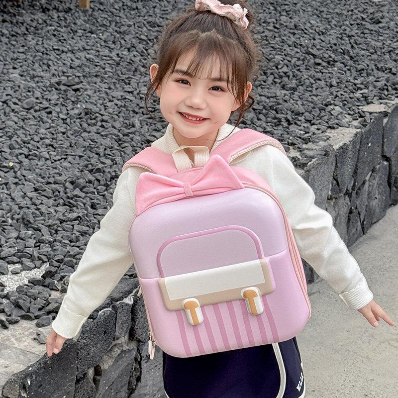 减负蛋壳幼儿园女孩书包2025新款防水蝴蝶结儿童双肩背包出游轻便
