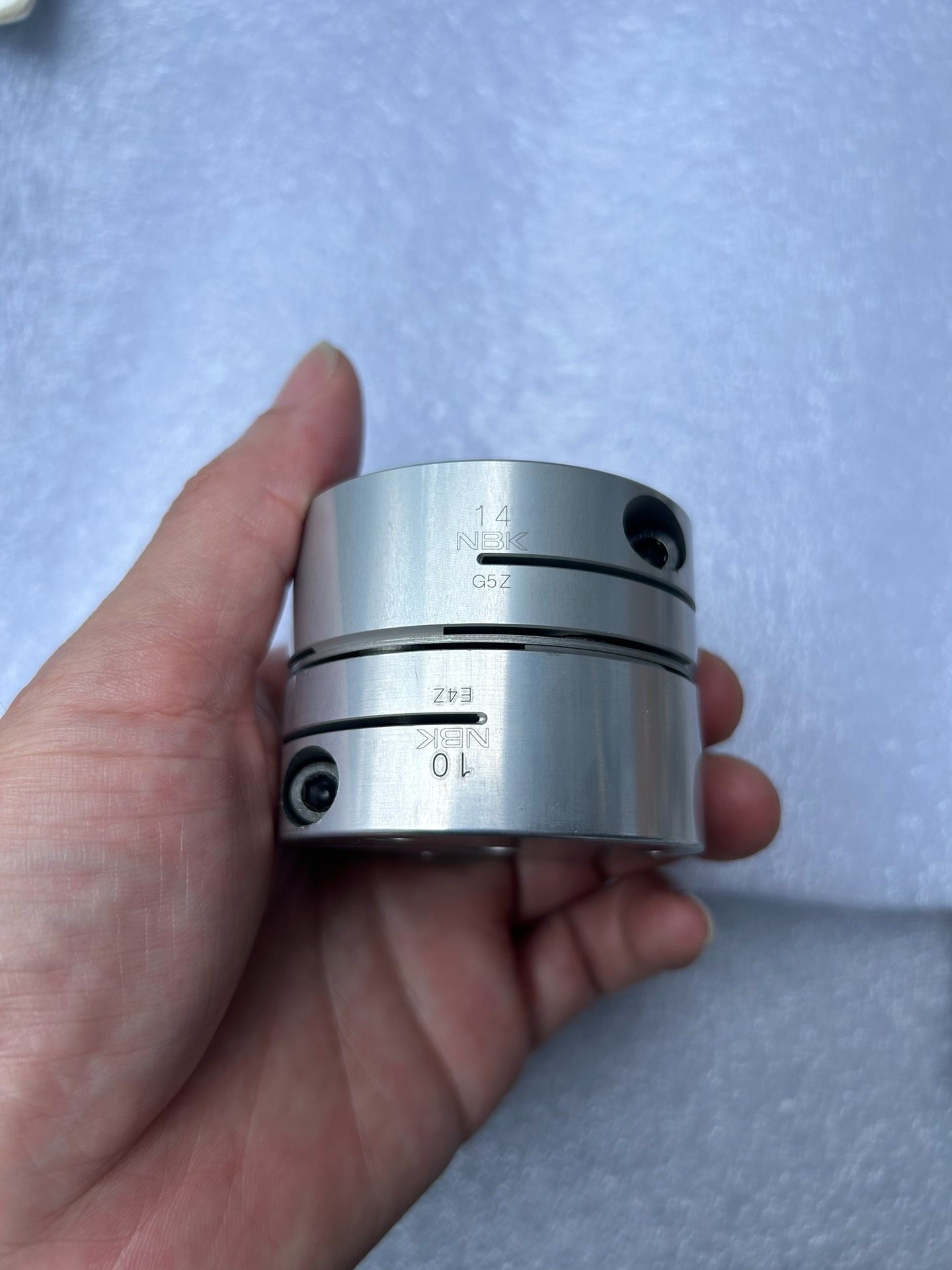 NBK联轴器10x14，实物拍摄，成色如图99新。适用于工业