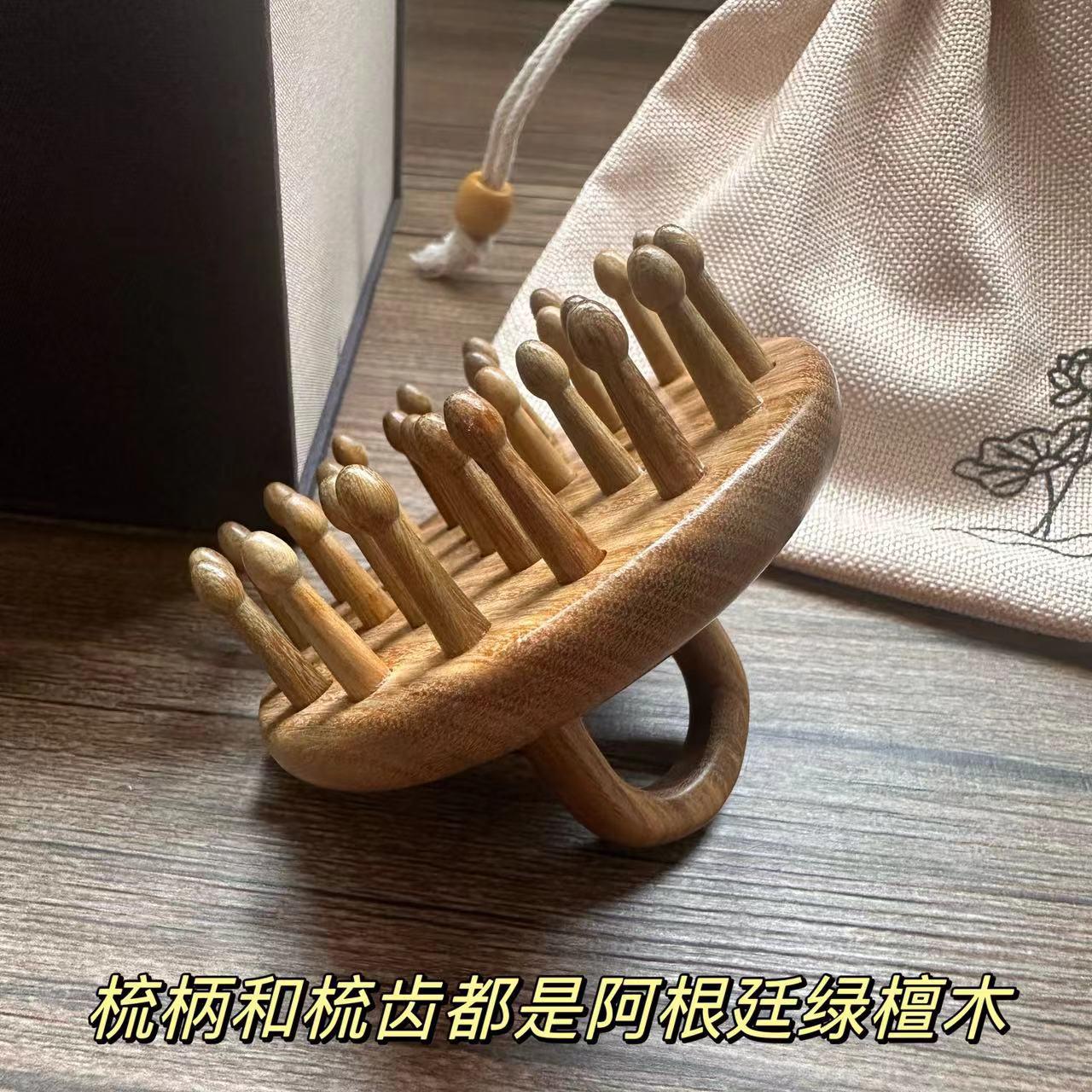 源头厂家绿檀木梳指环按摩梳批发头部经络梳子女圆盘28齿头皮刷子
