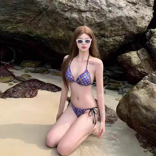 Cute girl with plaid print, neck tie, beach small chest,