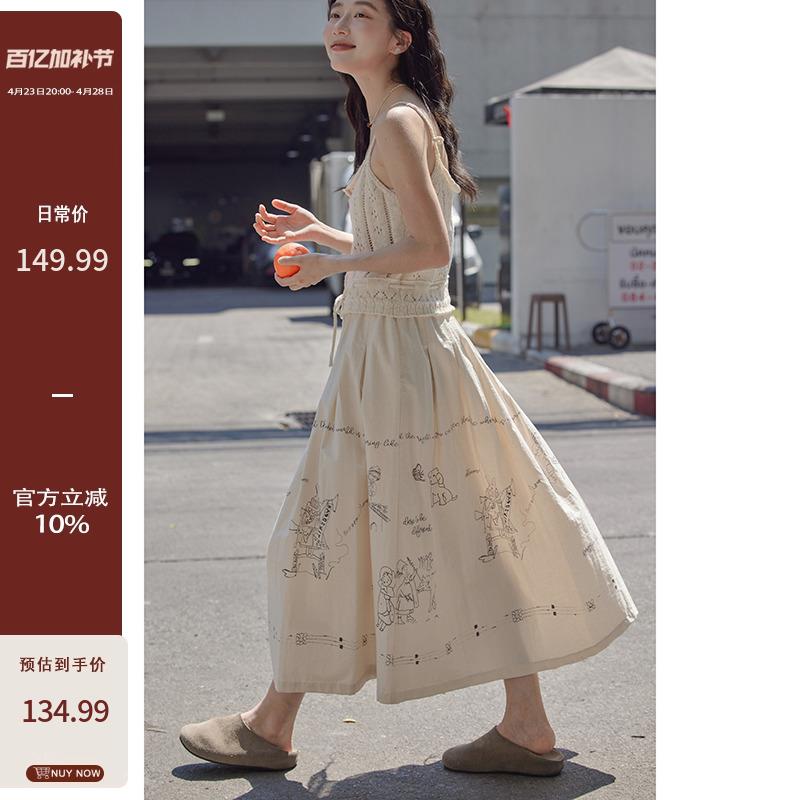 觅定卡通印花米白色半身裙女夏季2025新款高腰a字裙气质中长裙子