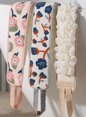 Dual-sided fine grit exfoliating bath towel with printed des