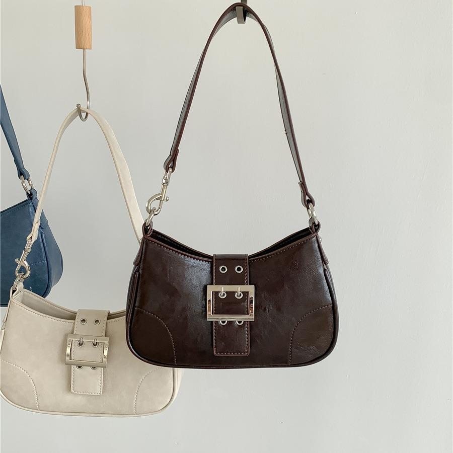 韩版新款单肩包女小众时尚手提包简约气质皮带装饰法棍腋下包女