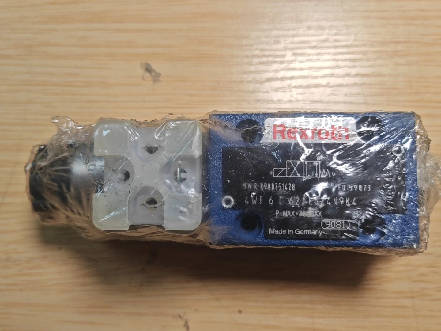 Оригинальный электромагнитный клапан Rexroth 4WE6D62/EG24N9K4/V.