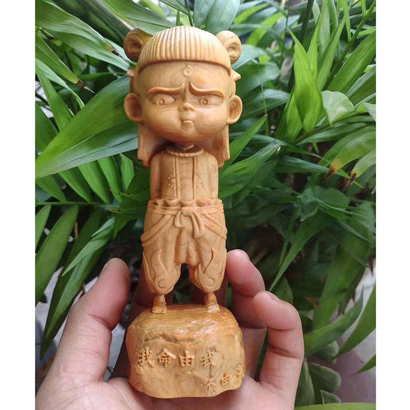崖柏木雕魔童哪吒三太子淘气版人物工艺品车载摆件家居办公室摆设