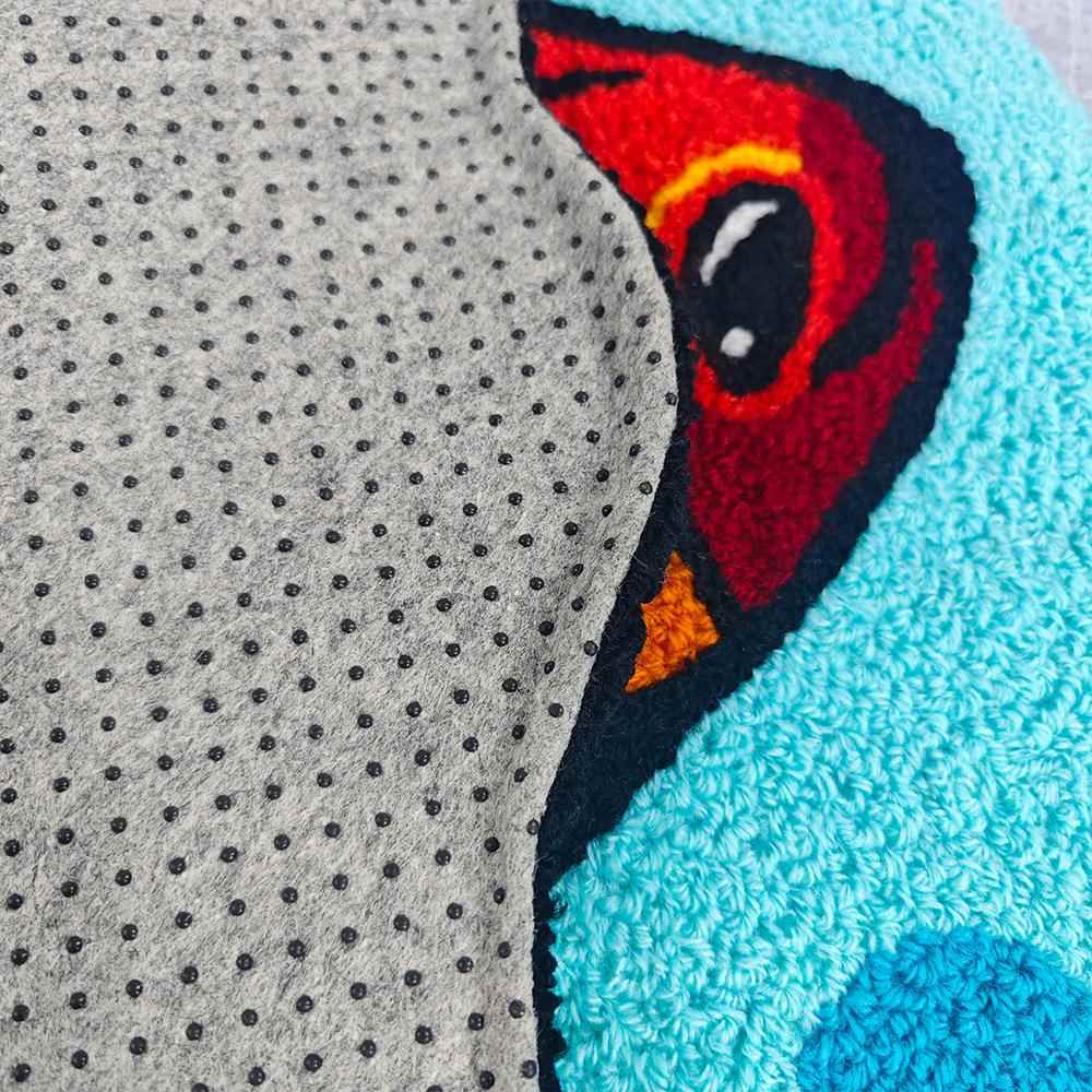 跨境创意洋孔雀刺绣孔雀鱼绣地毯家用卧室门海地垫刺儿童入房间书