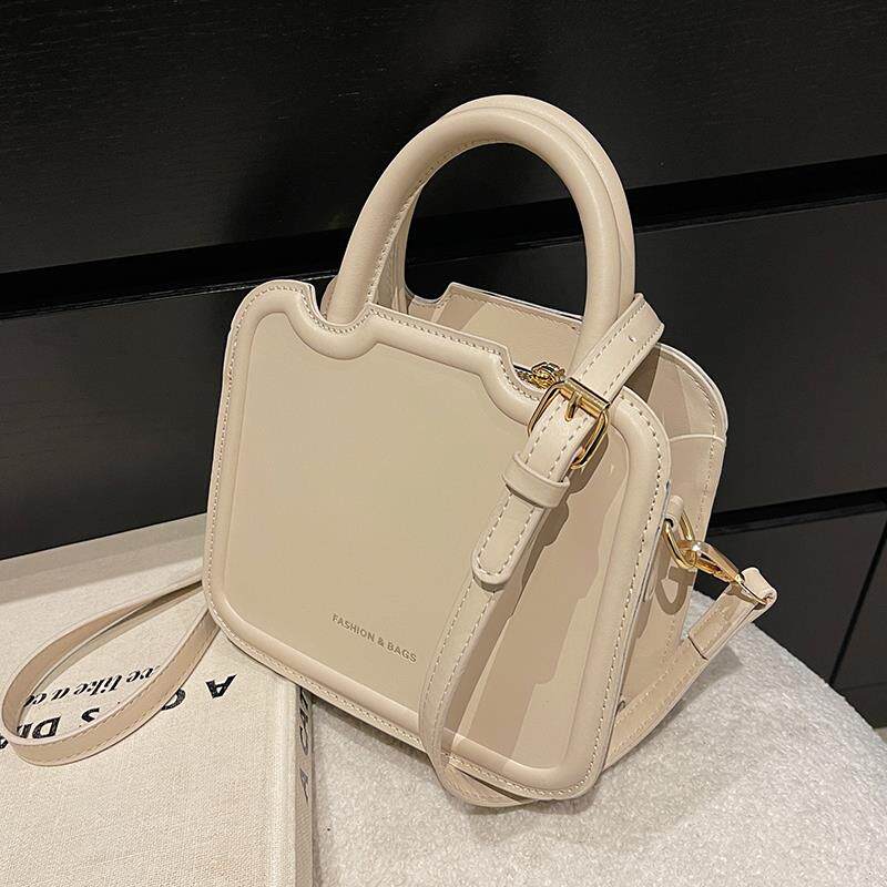 小众独特小包包女2025夏季新款白色质感斜挎小包高级感手提饼干包