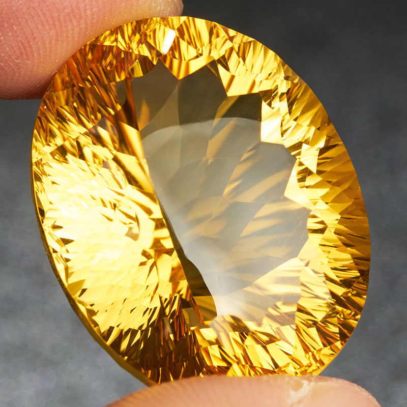 源头直供检漏价 47.7克拉大颗粒黄晶裸石戒面强火彩 支持私人定制