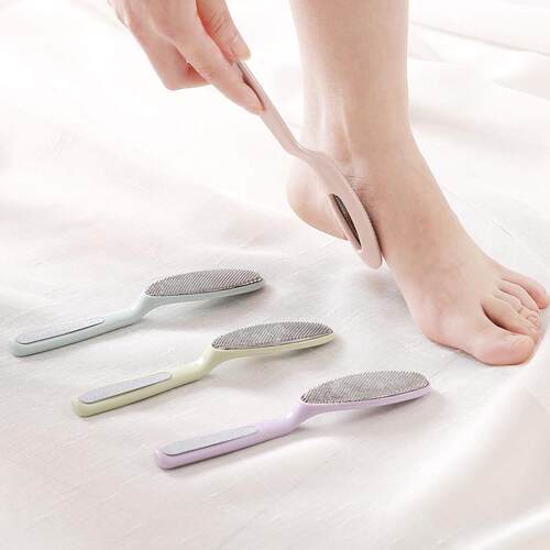 A stainless steel foot file and callus remover tool for smoo