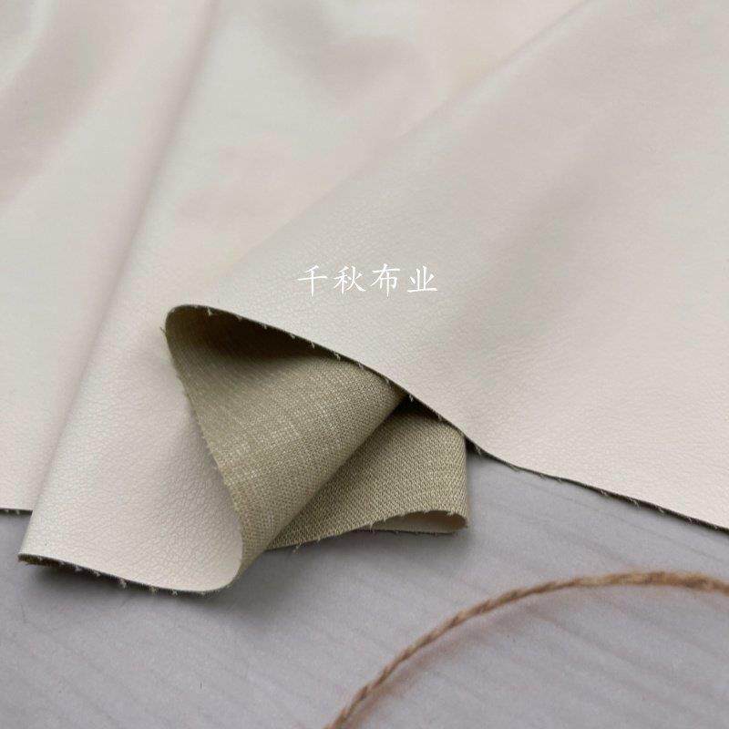 春夏薄款奶白色弹力人造皮革仿皮布料棉底板PU皮裙子裤子DIY面料