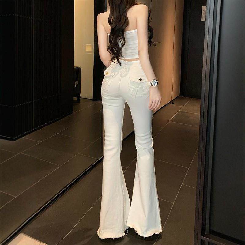 SNICYKER白色蝴蝶结少女微喇叭牛仔裤春款高腰修身提臀毛边裤