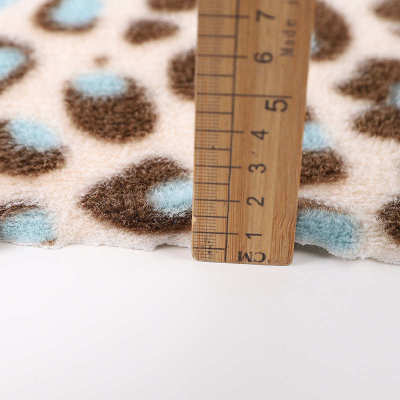 现货印花玉狐绒面料 全涤欧貂绒家居服时装靠垫绒布针织面料