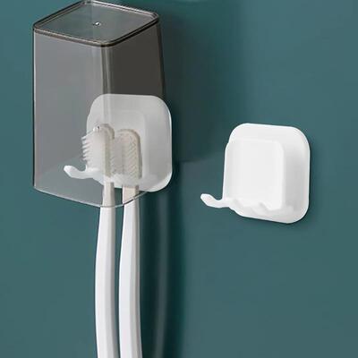 Wall-mounted toothbrush holder with suction cups, no drillin