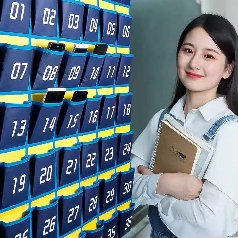 手机挂袋班级手机收纳袋手机袋挂墙收手机袋子布袋手机存放袋员工