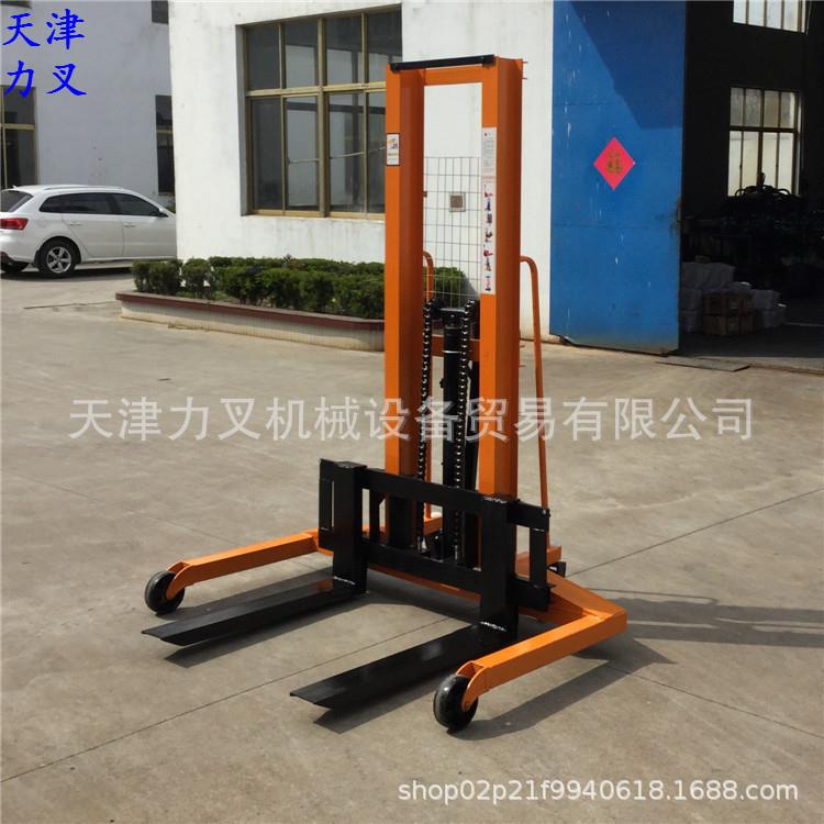 供应宽腿式手动堆高车液压升高车 手推托盘装卸车步行式手拉叉车