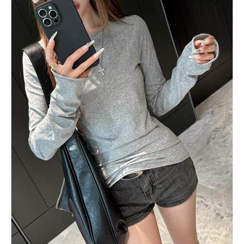 Grey long sleeved base shirt for women, with a small round