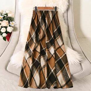 A womens brown checkered Plaid stretch waist Aline midi